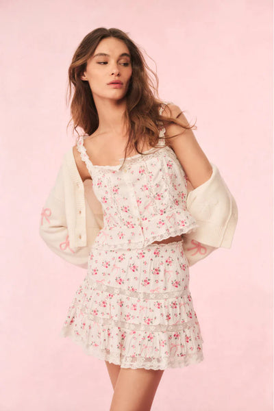 Viro Mini Skirt mit Spitzendetails erhältlich in Weiss (abgebildet in Weiss/Pink)