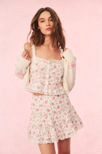 Viro Mini Skirt mit Spitzendetails erhältlich in Weiss/Blau (abgebildet in Weiss/Pink)