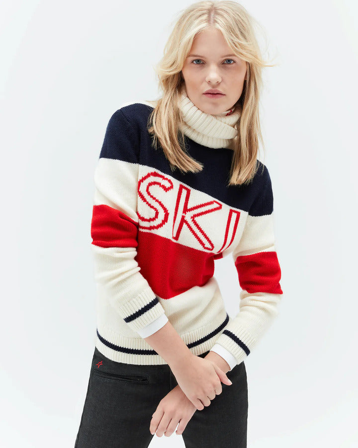 Weißer Rollkragen-Skipullover mit Ski-Motiv in Rot und Blau von Perfect Moment, Damenmode