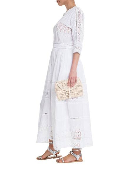 Langes LoveShackFancy-Kleid in Schwarz mit feiner Spitze, kurzen Ärmeln und Knöpfen.